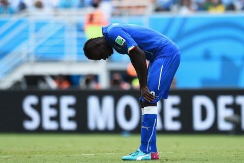 NATAL, BRAZIL - JUNE 24: Mario Balotelli of Italy reacts during the 2014 FIFA World Cup Brazil Group D match between Italy and Uruguay at Estadio das Dunas on June 24, 2014 in Natal, Brazil.  (Photo by Shaun Botterill - FIFA/FIFA via Getty Images)