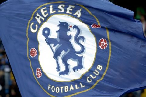 The Chelsea football club flag is waved on the pitich prior to the start to of the English Premier League soccer match between Chelsea and Leicester City, at Stamford Bridge stadium in London, Saturday, Oct. 15, 2016. (AP Photo/Alastair Grant)

