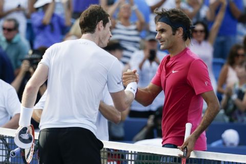 Roger Federer, of Switzerland, right, shakes hands with Andy Murray, of Great Britain, after winning their semifinal match at the Western & Southern Open tennis tournament, Saturday, Aug. 22, 2015, in Mason, Ohio. Federer won 4-6, 6-7 (6). (AP Photo/John Minchillo)