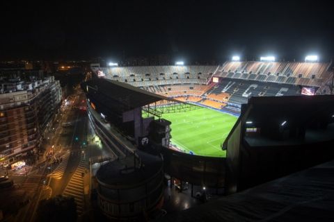 General view of Mestalla stadium during the Champions League round of 16 second leg soccer match between Valencia and Atalanta in Valencia, Spain, Tuesday March 10, 2020. The match is being in an empty stadium because of the coronavirus outbreak. (AP Photo/Emilio Morenatti)