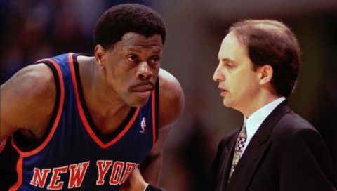 New York Knicks coach Jeff Van Gundy, right, has a few words with Knicks center Patrick Ewing after a timeout in the fourth quarter of their playoff game against the Cleveland Cavaliers Saturday, April 27, 1996, in Cleveland. The Knicks won 84-80 to go up 2-0 in the best-of-five game series. (AP Photo/Mark Duncan)