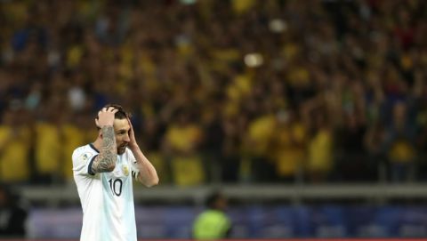 Argentina's Lionel Messi reacts during a Copa America semifinal soccer match against Brazil at the Mineirao stadium in Belo Horizonte, Brazil, Tuesday, July 2, 2019. (AP Photo/Natacha Pisarenko)