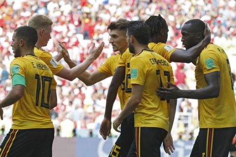 Belgium players celebrate after teammate Romelu Lukaku, right, scored their team's third goal during the group G match between Belgium and Tunisia at the 2018 soccer World Cup in the Spartak Stadium in Moscow, Russia, Saturday, June 23, 2018. (AP Photo/Antonio Calanni)