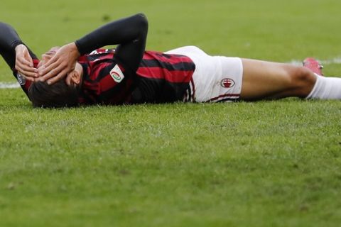 AC Milan's Andre Silva reacts after missing a scoring chance during the Serie A soccer match between AC Milan and Torino at the San Siro stadium in Milan, Italy, Sunday, Nov. 26, 2017. (AP Photo/Antonio Calanni)