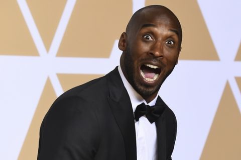 Kobe Bryant, winner of the award for best animated short for "Dear Basketball", poses in the press room at the Oscars on Sunday, March 4, 2018, at the Dolby Theatre in Los Angeles. (Photo by Jordan Strauss/Invision/AP)