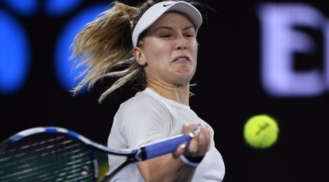 Canada's Eugenie Bouchard makes a forehand return to United States' Coco Vandeweghe during their third round match at the Australian Open tennis championships in Melbourne, Australia, Friday, Jan. 20, 2017. (AP Photo/Andy Brownbill)