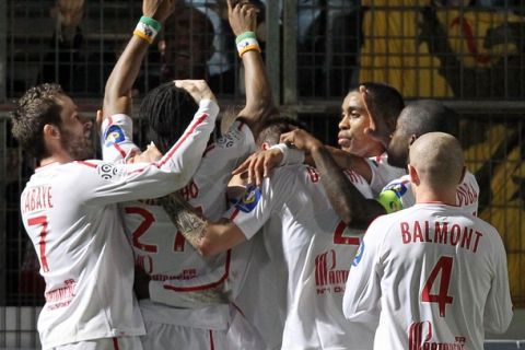 Lille's forward Gervinho (2nd L) jubilates after scoring a goal during their French L1 football match Nice vs Lille, on january 15, 2011 at the Ray Stadium in Nice. AFP PHOTO VALERY HACHE (Photo credit should read VALERY HACHE/AFP/Getty Images)