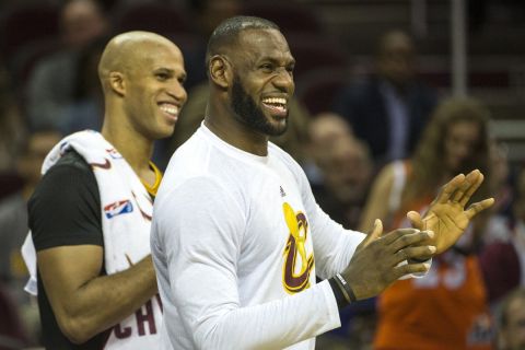 Cleveland Cavaliers' LeBron James (23) and teammate Richard Jefferson react during a basketball game against the New York Knicks in Cleveland, Tuesday, Oct. 25, 2016. (AP Photo/Phil Long)