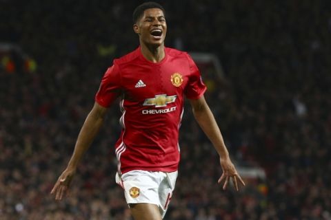 Manchester United's Marcus Rashford celebrates scoring his side's second goal during the Europa League quarterfinal second leg soccer match between Manchester United and Anderlecht at Old Trafford stadium, in Manchester, England, Thursday, April 20, 2017. (AP Photo/Dave Thompson)