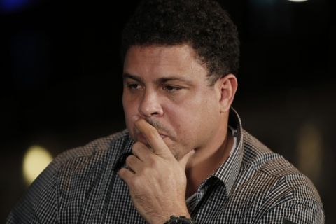 Brazilian former soccer player Ronaldo plays a poker match for charity against tennis player Rafael Nadal, of Spain, at a casino in central London, Tuesday, Nov. 18, 2014. According to the organisers, an online poker company, the athletes for the past two months have been in training, after Ronaldo challenged Nadal to the live head-to-head poker match after the two first went head-to-head in December at the European Poker Tour Prague Charity Challenge. Nadal won the match to receive a $ 50,000 donation for the Rafael Nadal Foundation. (AP Photo/Lefteris Pitarakis)