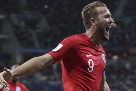 England's Harry Kane celebrates after scoring during the group G match between Tunisia and England at the 2018 soccer World Cup in the Volgograd Arena in Volgograd, Russia, Monday, June 18, 2018. (AP Photo/Thanassis Stavrakis)