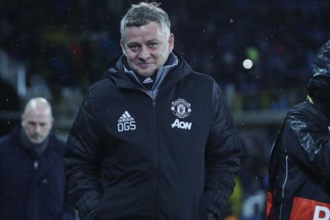 Manchester United's manager Ole Gunnar Solskjaer walks towards the bench prior an Europa League round of 32 first leg soccer match between Brugge and Manchester United at the Jan Breydel stadium in Bruges, Belgium, Thursday, Feb. 20, 2020. The match ended in a 1-1 draw. (AP Photo/Francisco Seco)