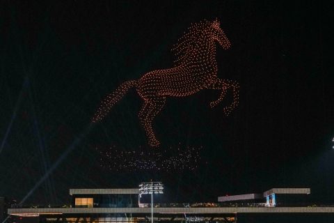 Drones create an illuminated Arabian horse shape ahead of the Saudi Arabia Formula One Grand Prix at the Jeddah corniche circuit in Jeddah, Saudi Arabia, Sunday, March 19, 2023. (AP Photo/Hassan Ammar)