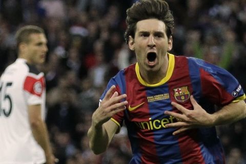Barcelona's Lionel Messi celebrates scoring against Manchester United during their Champions League final soccer match at Wembley Stadium, London, Saturday, May 28, 2011. (AP Photo/Matt Dunham)