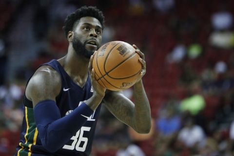 Utah Jazz's Willie Reed plays against the Houston Rockets in an NBA summer league basketball game Thursday, July 11, 2019, in Las Vegas. (AP Photo/John Locher)