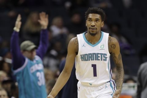 Charlotte Hornets' Malik Monk (1) reacts after making a basket against the Detroit Pistons during the second half of an NBA basketball game in Charlotte, N.C., Wednesday, Dec. 12, 2018. (AP Photo/Chuck Burton)