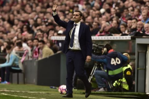 Athletic Bilbao's head manager Ernesto Valverde gestures during the Spanish La Liga soccer match between Real Madrid and Athletic Bilbao, at San Mames stadium, in Bilbao, northern Spain, Saturday, March 18, 2017. (AP Photo/Alvaro Barrientos)