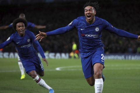 Chelsea's Reece James, right, celebrates with teammates after scoring his side's fourth goal during the Champions League, group H, soccer match between Chelsea and Ajax, at Stamford Bridge in London, Tuesday, Nov. 5, 2019. (AP Photo/Ian Walton)