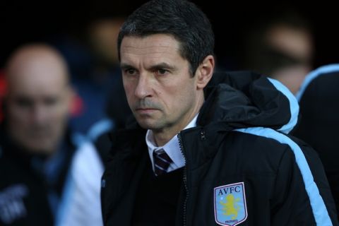 FILE - In this file photo dated Saturday, Jan. 2, 2016, Aston Villa's manager Remi Garde waits for the start of the English Premier League soccer match between Sunderland and Aston Villa at the Stadium of Light, Sunderland, England.  Garde has left the bottom-placed Premier League club left by mutual consent, after nearly five months in charge at the club. (AP Photo/Scott Heppell, FILE)