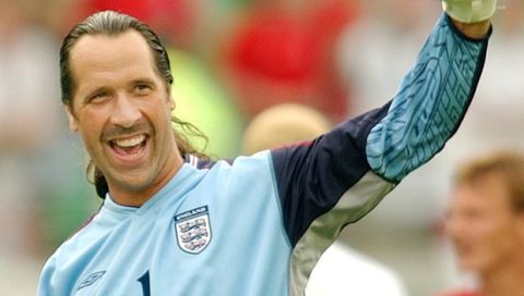 England goalkeeper David Seaman celebrates at the end of the 2002 World Cup Group F soccer match between England and Nigeria at the Nagai Stadium II in Osaka, Japan Wednesday June 12, 2002. England drew 0-0 with Nigeria and qualified for the next round. The other teams in Group F are Argentina and Sweden. (AP Photo/Domenico Stinellis)