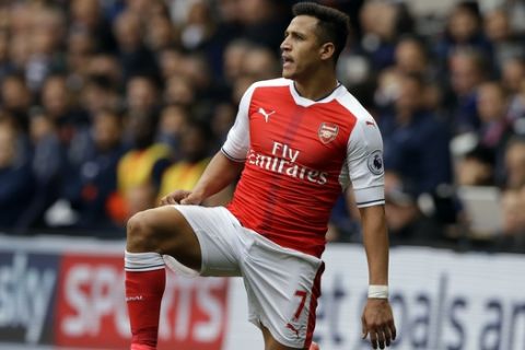 Arsenal's Alexis Sanchez looks on during the English Premier League soccer match between Tottenham Hotspur and Arsenal at White Hart Lane in London, Sunday, April 30, 2017. (AP Photo/Alastair Grant)