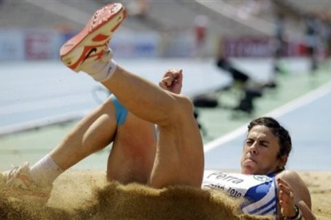 Greece's Athanasia Perra competes in the Women's Triple Jump during the European Athletics Championships, in Barcelona, Spain, Thursday, July 29, 2010. (AP Photo/Matt Dunham)