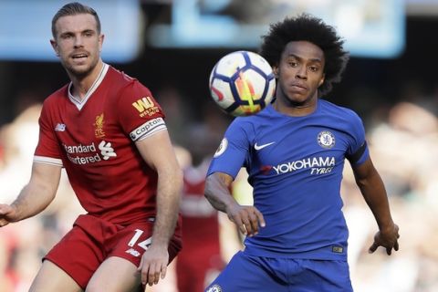 Chelsea's Willian, right, challenges for the ball with Liverpool's Jordan Henderson during the English Premier League soccer match between Chelsea and Liverpool at Stamford Bridge stadium in London, Sunday, May 6, 2018. (AP Photo/Kirsty Wigglesworth)