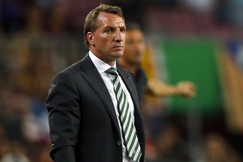 Celtic's manager Brendan Rodgers watches a Champions League, Group C soccer match between Barcelona and Celtic, at the Camp Nou stadium in Barcelona, Spain, Tuesday, Sept. 13, 2016. (AP Photo/Manu Fernandez)