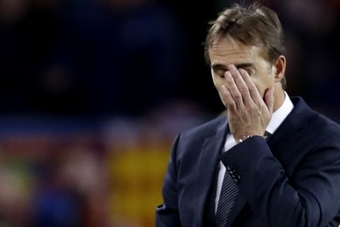 FILE - In this  Sunday, Oct. 28, 2018 file photo Real coach Julen Lopetegui gestures as walks off the pitch after losing 5-1 during the Spanish La Liga soccer match between FC Barcelona and Real Madrid at the Camp Nou stadium in Barcelona, Spain. Real Madrid finally pulled the trigger and fired coach Julen Lopetegui on Monday Oct. 29. The not-surprising announcement followed a meeting by the club's board of directors, a day after the team was crushed by Barcelona 5-1 at Camp Nou Stadium.(AP Photo/Manu Fernandez, File)