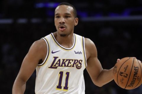 Los Angeles Lakers' Avery Bradley (11) during the first half of an NBA basketball against the Toronto Raptors game Sunday, Nov. 10, 2019, in Los Angeles. (AP Photo/Marcio Jose Sanchez)