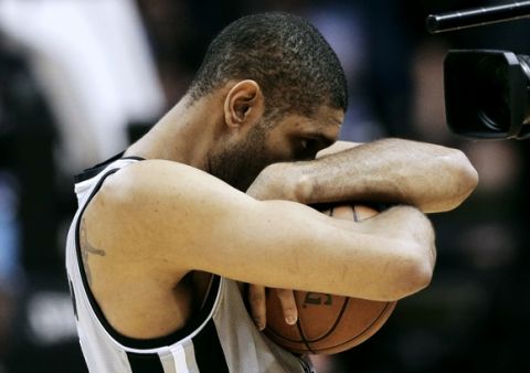San Antonio Spurs' Tim Duncan takes a moment before facing the Golden State Warriors in Game 2 of a Western Conference semifinal NBA basketball playoff series, Wednesday, May 8, 2013, in San Antonio. (AP Photo/Eric Gay) ORG XMIT: TXKJ102
