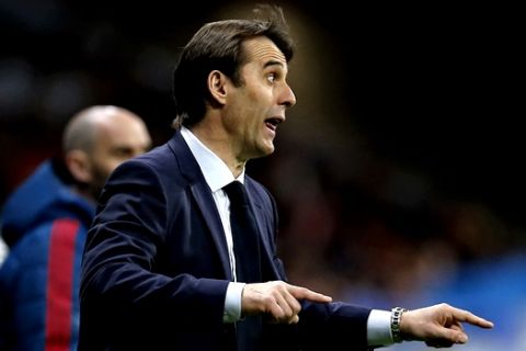 FILE - In this March 27, 2018 file photo, Spain's national soccer coach Julen Lopetegui reacts during the international friendly soccer match between Spain and Argentina at the Wanda Metropolitano stadium in Madrid, Spain. Lopetegui has surpassed expectations after stepping into a tricky situation when he took as coach over the Spanish national team two years ago but he has made Spain a top contender again heading into the World Cup in Russia by giving the team a fresh identity and successfully mixing talented youngsters and fading veterans. (AP Photo/Paul White, File)