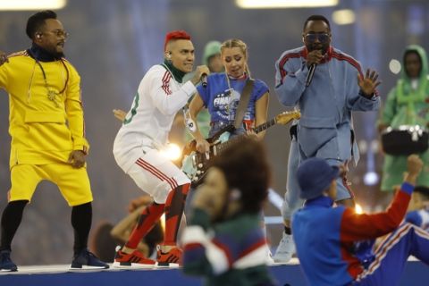 The Black Eyed Peas perform before the Champions League final soccer match between Juventus and Real Madrid at the Millennium stadium in Cardiff, Wales Saturday June 3, 2017. (AP Photo/Frank Augstein)
