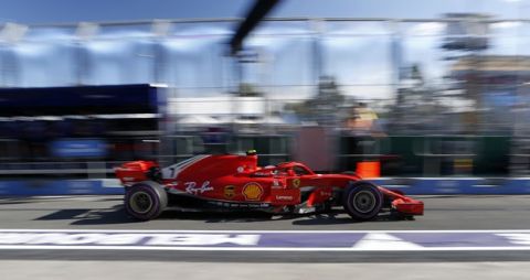 Ferrari driver Kimi Raikkonen of Finland drives along the pit during the second practice session at the Australian Formula One Grand Prix in Melbourne, Friday, March 23, 2018. The first race of the 2018 seasons is on Sunday. (AP Photo/Asanka Brendon Ratnayake)