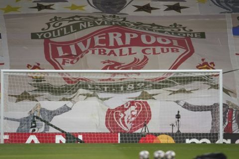 A Liverpool giant flag seen inside the Anfield stadium ahead the Champions League quarter final second leg soccer match between Liverpool and Real Madrid at Anfield stadium in Liverpool, England, Wednesday, April 14, 2021. (AP Photo/Jon Super)