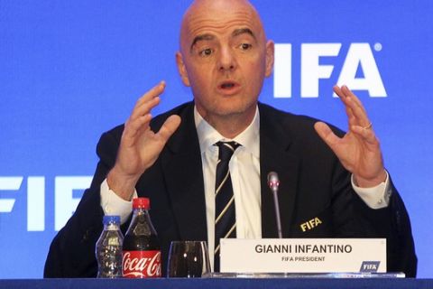 FIFA President Gianni Infantino addresses a press conference in Kolkata, India, Friday, Sept. 27, 2017. The 2018 World Cup champion will get $38 million from a prize fund FIFA has increased by 12 percent to $400 million. FIFA said Friday that each of the 32 competing national federations in Russia will get at least $8 million, the same as in 2014 when the overall prize fund was $358 million. (AP Photo)