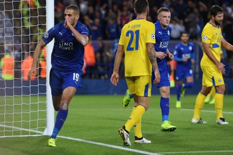 LEICESTER, ENGLAND - SEPTEMBER 27:  Islam Slimani of Leicester City (19) celebrates as he scores their first goal during the UEFA Champions League Group G match between Leicester City FC and FC Porto at The King Power Stadium on September 27, 2016 in Leicester, England.  (Photo by Shaun Botterill/Getty Images)