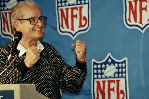 CORRECTS TO 1988 SUPER BOWL, NOT 1990 AS ORIGINALLY SENT - FILE - In this Oct. 27, 1993, file photo, San Diego Chargers owner Alex Spanos gestues after the NFL announced that San Diego secured the 1988 Super Bowl. Alex Spanos, who used his fortune from construction and real estate to buy the Chargers in 1984, died Tuesday, Oct. 9, 2018. He was 95.(AP Photo/Tim Boyle, File)
