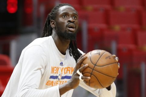 New York Knicks Maurice Ndour (2) warms up prior to an NBA basketball game against the Miami Heat, Friday, March 31, 2017, in Miami. The Knicks defeated the Heat 98-94. (AP Photo/Joel Auerbach)