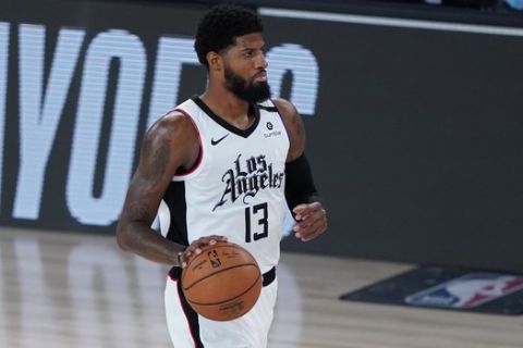 Los Angeles Clippers' Paul George (13) dribbles the ball down court against the Dallas Mavericks during the first half of an NBA basketball first round playoff game Tuesday, Aug. 25, 2020, in Lake Buena Vista, Fla. (AP Photo/Ashley Landis, Pool)