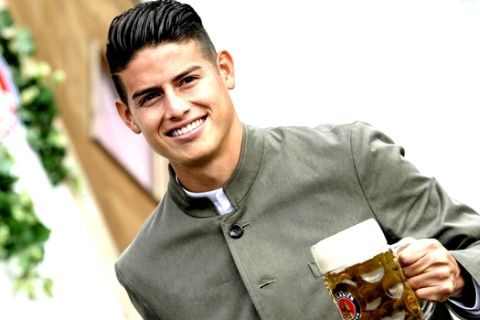 James Rodriguez, player of the German first division, Bundeliga, soccer team FC Bayern Munich, arrives at the 'Oktoberfest' beer festival in Munich, Germany, Sunday, Oct. 7, 2018. (Matthias Balk/dpa via AP)