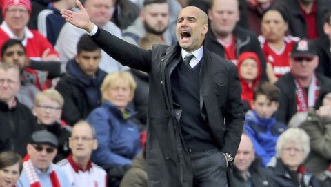 Manchester City manager Pep Guardiola gestures from the touchline during their match against Middlesbrough during their English Premier League soccer match at the Riverside Stadium in Middlesbrough, England, Sunday April 30, 2017. (Owen Humphreys/PA via AP)