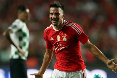 Benfica's Samaris, celebrates after scoring his team's second goal against Moreirense during a Portuguese league soccer match at Benfica's Luz stadium in Lisbon, Saturday, Aug. 29, 2015. (AP Photo/Steven Governo)