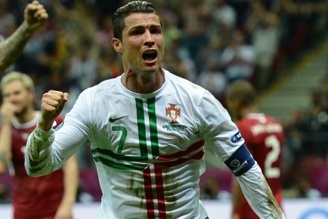 Cristiano Ronaldo of Portugal celebrates scoring a goal during their UEFA EURO 2012 quarter-final against the Czech Republic