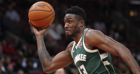 Milwaukee Bucks' Thanasis Antetokounmpo drives to the basket during an NBA preseason basketball game against the Chicago Bulls Monday, Oct. 7, 2019, in Chicago. (AP Photo/Charles Rex Arbogast)
