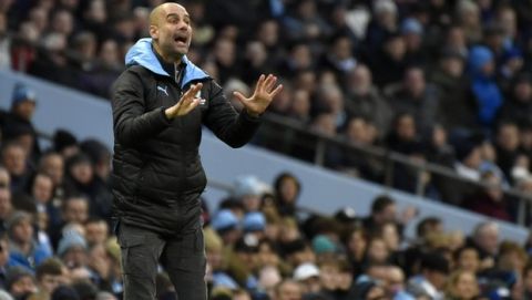 Manchester City's head coach Pep Guardiola reacts during the English Premier League soccer match between Manchester City and Crystal Palace at Etihad stadium in Manchester, England, Saturday, Jan. 18, 2020. (AP Photo/Rui Vieira)