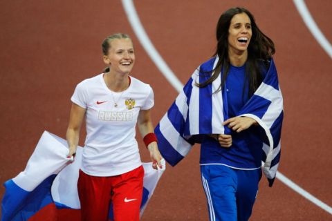 ZURICH, SWITZERLAND - AUGUST 14:  Gold medalist Anzhelika Sidorova of Russia and silver medalist Ekaterini Stefanidi of Greece celebrate after the Women's Pole Vault final during day three of the 22nd European Athletics Championships at Stadium Letzigrund on August 14, 2014 in Zurich, Switzerland.  (Photo by Dean Mouhtaropoulos/Getty Images)