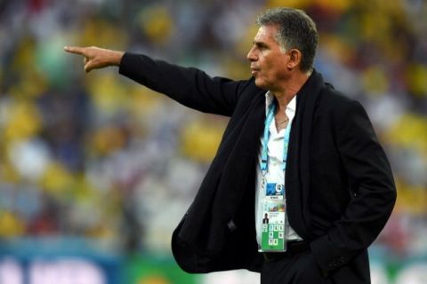 CURITIBA, BRAZIL - JUNE 16:  Coach Carlos Queiroz of Iran gestures during the 2014 FIFA World Cup Brazil Group F match between Iran and Nigeria at Arena da Baixada on June 16, 2014 in Curitiba, Brazil.  (Photo by Mike Hewitt - FIFA/FIFA via Getty Images)
