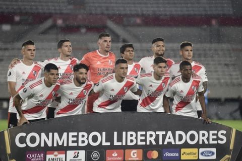 Argentina's River Plate team poses for a group photo prior to their a Copa Libertadores Group D soccer match at the Antonio Vespucio Liberti stadium in Buenos Aires, Argentina, Wednesday, March 11, 2020. (AP Photo/Gustavo Garello)
