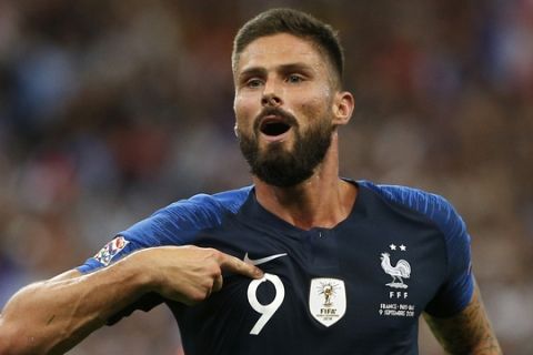 Olivier Giroud of France celebrates after scoring his sides 2nd goal during the UEFA Nations League soccer match between France and the Netherlands at the Stade De France in Paris, Sunday, Sept. 9, 2018. (AP Photo/Thibault Camus)